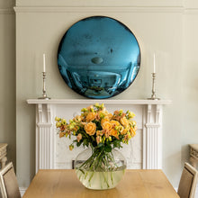 Load image into Gallery viewer, Aged Blue Convex Round Mirror placed on a white mantlepiece and flanked by candles

